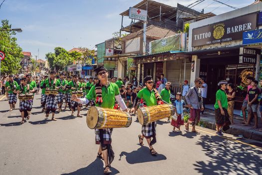 Ubud, Bali, Indonesia - April 22, 2019 : Royal cremation ceremony prepation. Balinese hindus religion procession. Bade and Lembu Black Bull symbol of transportation for the spirit to the heaven.