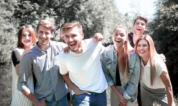 portrait of a group of friends on the background of the Park. lifestyle