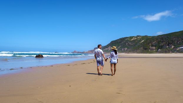 A panoramic view of the lagoon of Knysna, South Africa. beach in Knysna, Western Cape, South Africa. couple man and woman on a trip at the garden route