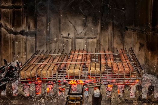 Roasting fresh meat in the fireplace. Make BBQ