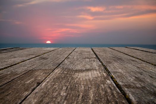 Wooden table, tabletop, sunset light background, Empty wooden shelf, counter, desk. Perspective wood table top