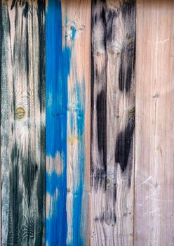 old different painted surface boards. Wooden background