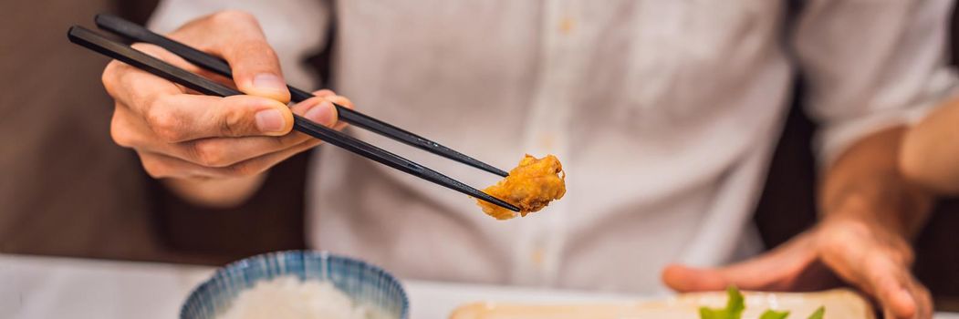 Bento set of prawn tempura and chicken teriyaki in japanese restaurant. BANNER, LONG FORMAT