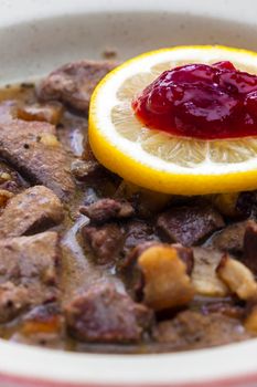 venison goulash with lemon and cranberries