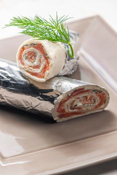 tortilla filled with smoked salmon and dill cream cheese