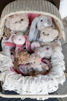 stuffed toys in the old fashioned buggy