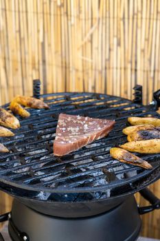 grilled tuna steak with baked potatoes