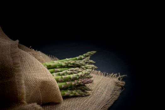 still life with fresh green asparagus