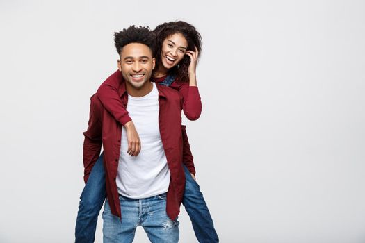 Close-up young african american couple enjoy riding back