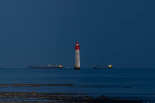 Phare de Chauvea near Ile de Re with ships to La Rochelle, Pays de la Loire, France