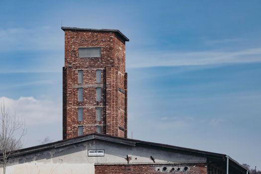 Red Tower of Death, UNESCO site with inscription in Czech language "Ruda vez smrti" a national monument in Dolni Zdar near Ostrov, Western Bohemia, Czech Republic