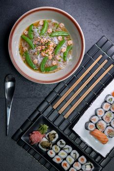 Various dishes of Asian cuisine with typical sushi