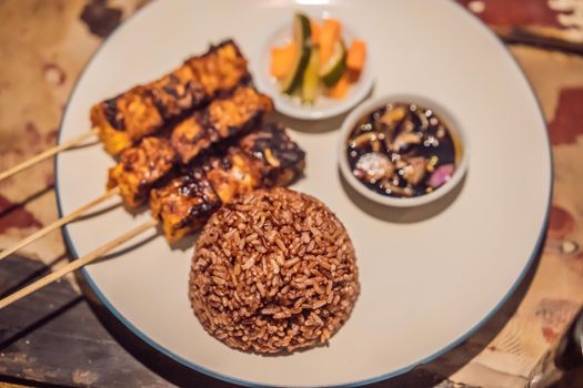 Different kinds of satay dinner Indonesian food.