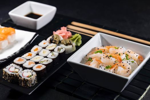 Various dishes of Asian cuisine with typical sushi