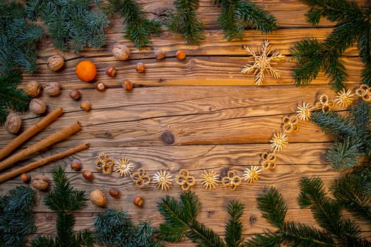 Traditional Czech Christmas on wood decoration with twig and nut