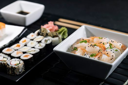 Various dishes of Asian cuisine with typical sushi