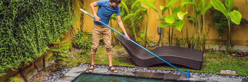 Cleaner of the swimming pool . Man in a blue shirt with cleaning equipment for swimming pools. Pool cleaning services. BANNER, LONG FORMAT