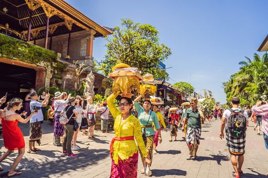 Ubud, Bali, Indonesia - April 22, 2019 : Royal cremation ceremony prepation. Balinese hindus religion procession. Bade and Lembu Black Bull symbol of transportation for the spirit to the heaven.