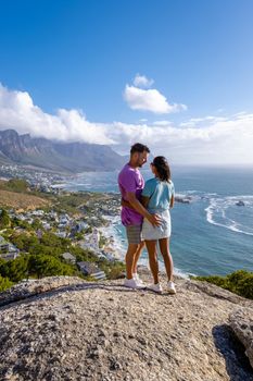 View from The Rock viewpoint in Cape Town over Campsbay, view over Camps Bay with fog over the ocean. fog coming in from the ocean at Camps Bay Cape Town South Africa