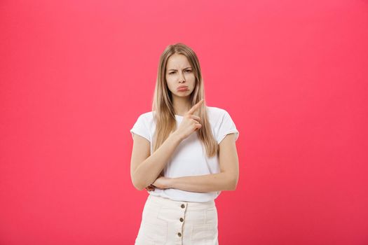 Shot of bored annoyed beautiful teenage girl with straight blond hair looking at camera with boring and annoying face, wearing trendy eyewear and long-sleeved sweater, got tired at school.