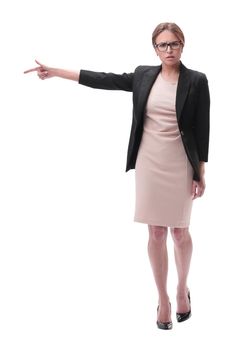full length . strict businesswoman pointing to the side. isolated on grey background