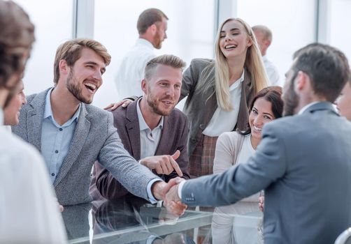 handshake business partners during a meeting in the office. concept of cooperation