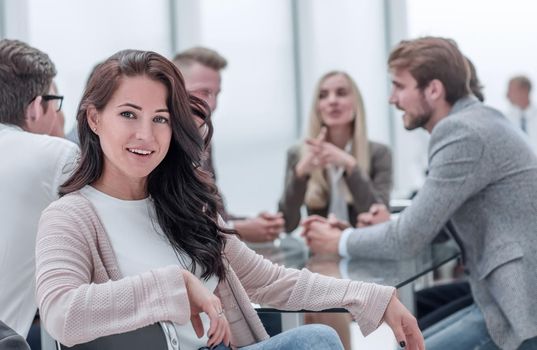 successful business woman sitting in front of a table in a conference room. business concept