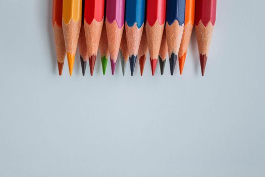 Colorful pencils on white backround