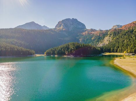 Aerial view on Black lake in National park Durmitor. Montenegro. Travel around Montenegro concept.