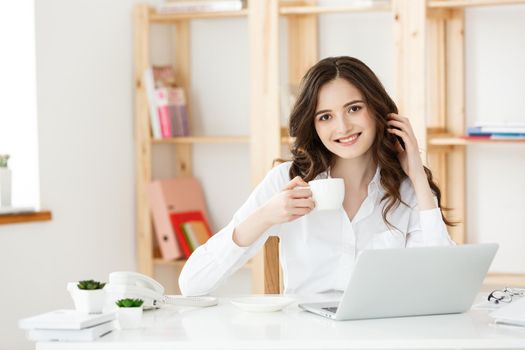 Woman Freelancer or business woman used Labtop working at modern office. Business and Technology concept.