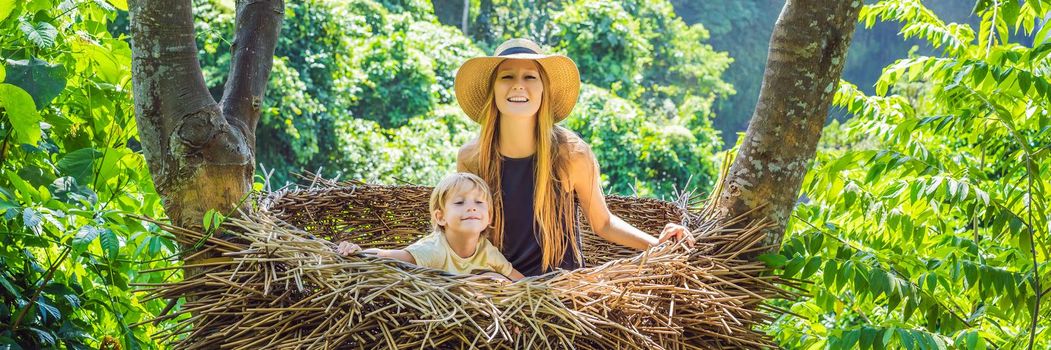 BANNER, LONG FORMAT Bali trend, straw nests everywhere. Young tourist enjoying her travel around Bali island, Indonesia. Making a stop on a beautiful hill. Photo in a straw nest, natural environment. Lifestyle.