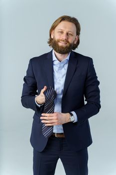 the man took off his tie and held it in his hands