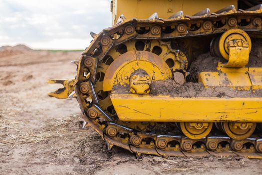 Crawler construction equipment in yellow color