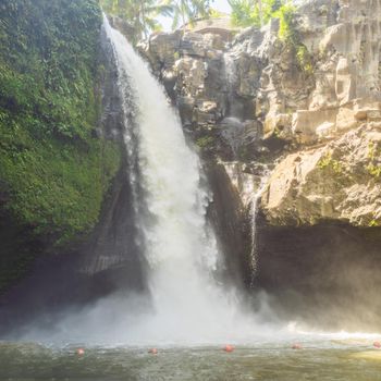 Tegenungan Waterfall near Ubud, Bali, Indonesia. Tegenungan Waterfall is a popular destination for tourists visiting Bali, Indonesia.