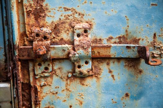 Metal bolt on the gate of old.