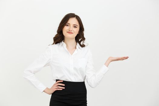 Portrait happy businesswoman showing and presenting copy space in business dress suit isolated on white background