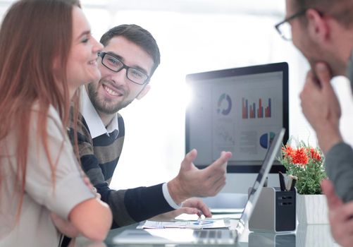 business team discussing financial charts in the office.