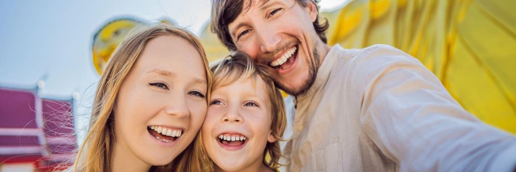 Happy tourists mother, father and son on background ofLying Buddha statue. BANNER, LONG FORMAT