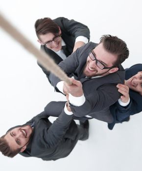top view .business team helps the boss to climb up.photo with copy space