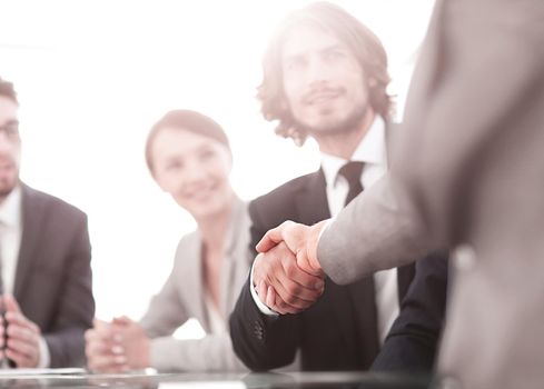 background image of handshake of business partners.photo with copy space