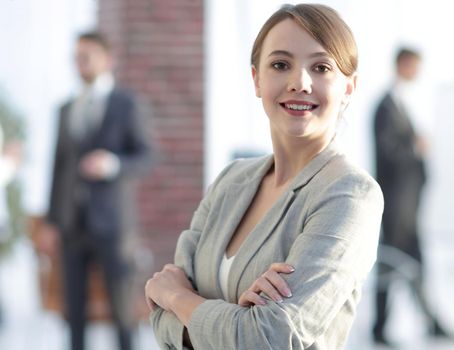 confident business woman on the background of the office.