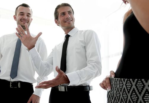 close up of creative business team standing in office