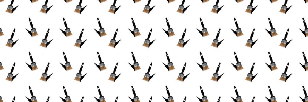 Construction brushes with shadow on a white background. Seamless texture of construction brushes.