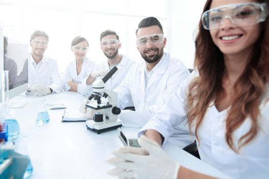Group of young clinicians experimentation in research laboratory.development of technology