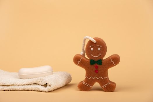 Towel soap and washcloth in the form of a cheerful cookie for comfortable washing of the child. Child care and child hygiene.
