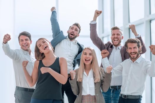 close up. a group of happy young business people. photo with copy space