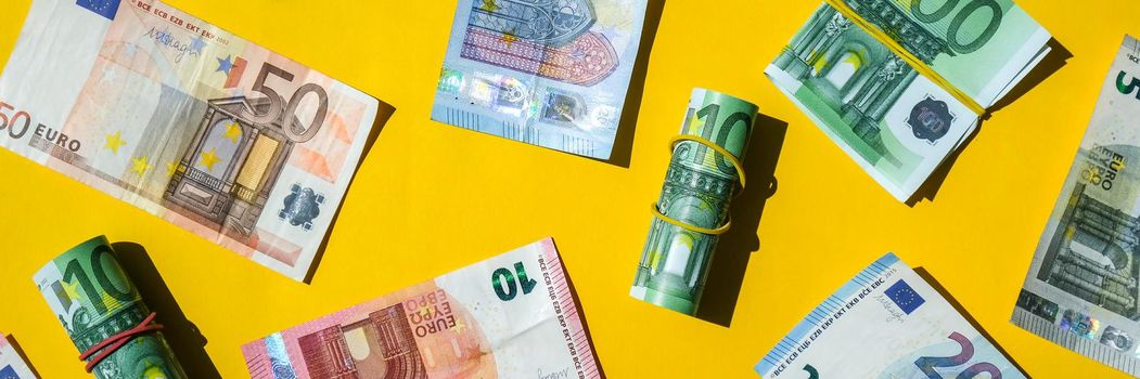 Euro bills are creative layout. Business concept, development perspective. Flat lay. Top view. Minimal creative style pattern. Business budget of wealth and prosperity finance.