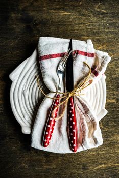 Vintage dinnerware served on wooden table