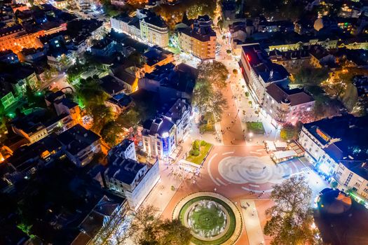 Varna, Bulgaria - October 28, 2019; Aerial view from the drone of the illuminated centrum of Varna city at night