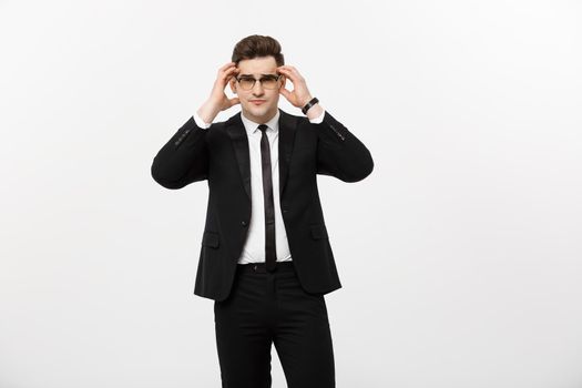 Business Concept: Portrait handsome young businessman wearing glasses isolated over white background.